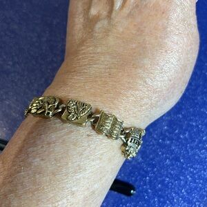 Brass story of the Bible charms alpha and omega bracelet